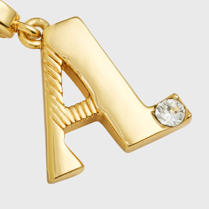 Monogram charm, A