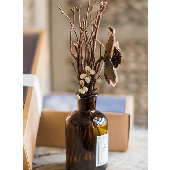 Natural Dried Flower Branches in Glass Bottle